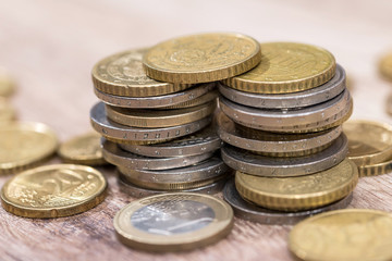 shiny euro coins on the table. close up.
