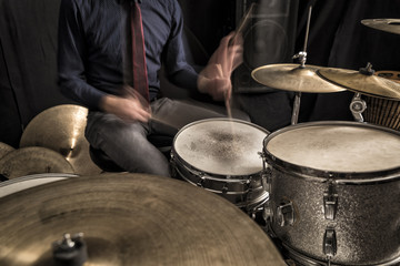 Drummer rolling on snare, motion blur