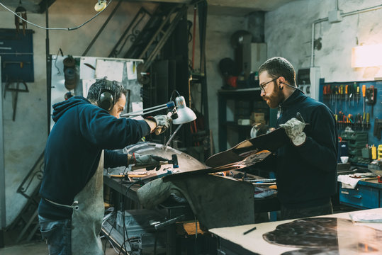 Two men in workshop