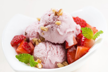 delicious strawberry ice cream in a bowl, closeup