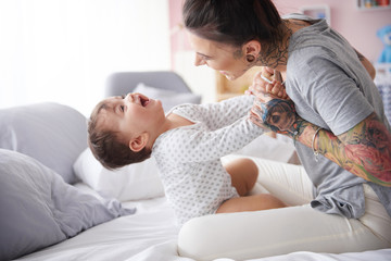Mother having laughs with her lovely son .