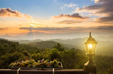 Foto op Aluminium sunset on the mountain from balcony view © kunchainub