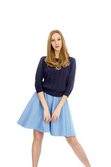 beautiful young blonde girl in blue dress and blouse