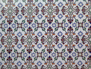 Wall tiled with blue floral ceramic tiles