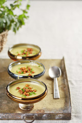 three portions of vegetable creme soup