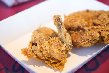 Fried chicken on white plate