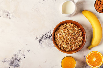 Healthy breakfast - bowl of muesli, nuts and fruit