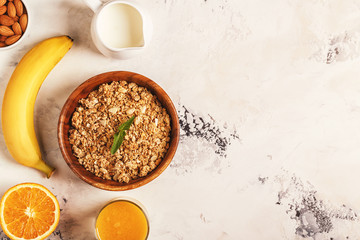 Healthy breakfast - bowl of muesli, nuts and fruit