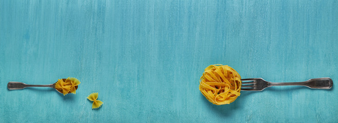 Concept of food, pasta on a blue background