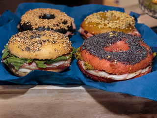 White and Red Sandwich with Seeds filled with Italian Ham