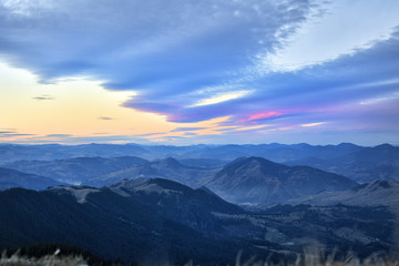Majestic sunset in the mountains landscape. Dramatic sky. Carpathian, Romania, Europe.