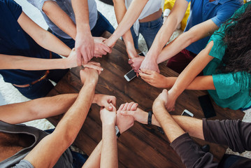 Fototapeta na wymiar Group of Diverse Hands Together Joining. Concept teamwork and friendship