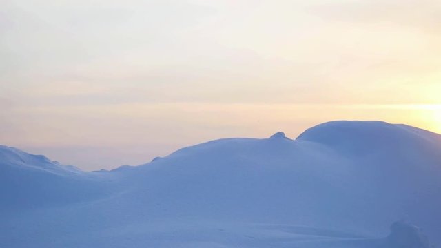 Beautiful Landscape of snowy mountain peak on amazing sunset advanture winter in slow motion. 1920x1080