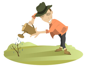 Smiling man watering a tree. Smiling man is watering a little tree using watering pot
