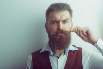 bearded man, brutal caucasian hipster with serious face