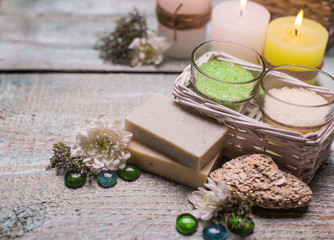 spa setting  therapy with flowers, soap, candles   isolated on  wooden background.