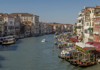 Fototapeta na wymiar Stunning aerial view of the Grand Canal from the Rialto bridge on a sunny summer day, Venice, Italy