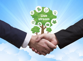 Technology, the Internet, business and network concept. Businessmen shake hands: Live stream