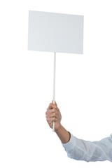 Hand of executive holding blank placard