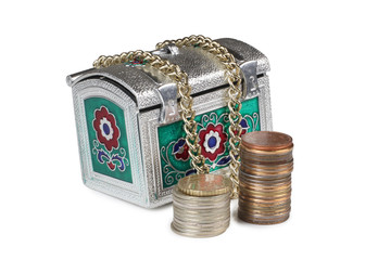 Metal chest and gold coins on white background