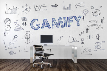 GAMIFY | Desk in an office with symbols