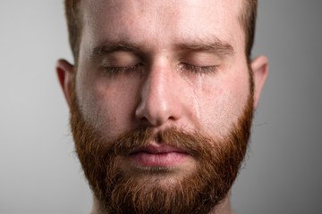 Close Up of a Crying Man with Red Beard