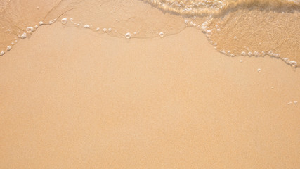 Sand beach and wave.