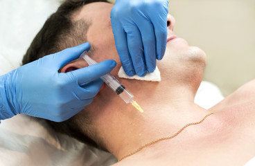 Man passes a course of mesotherapy clinic 