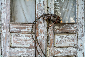Closeup wooden door with 50 years old lock