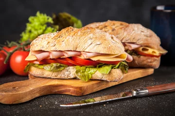 Rolgordijnen Delicious ciabatta sandwich © George Dolgikh