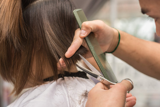 Healthy hair tips. Cropped shot of a female client receiving a haircut at the local beauty salon