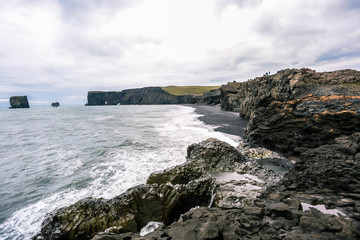 Fototapeta na wymiar Orange mountains. Black sand beach, Vik, Dyrholaey, Iceland.