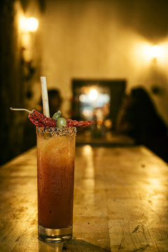 spicy bloddy mary tomato cocktail drink in bar