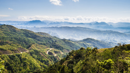 Fototapeta na wymiar Mountain and blue sky at Kasi, Laos