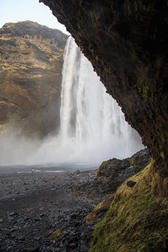 Skógafoss waterfall in southern Iceland on a cloudy winter day. It is located on the river Skógá and is one of the largest waterfalls in the country. © pablobenii