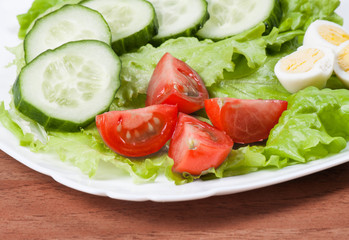 Ripe vegetables on wood desk.