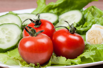 Ripe vegetables on wood desk.