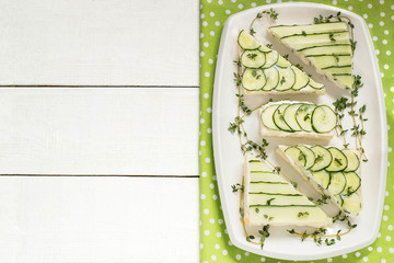 Delicious sandwiches with cream cheese and fresh cucumber
