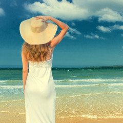 Woman looking on the sea