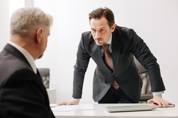 Fototapeta premium Angry boss expressing emotions in the office