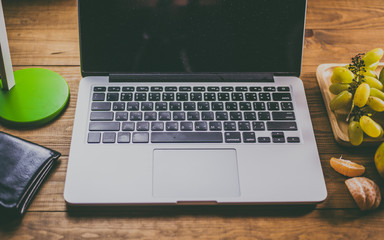 Laptop computer with fresh fruit