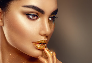 Fashion art golden skin woman face portrait closeup © Subbotina Anna