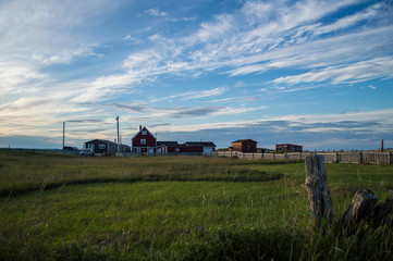 Charming Colorful Houses and a Meadow at Sunset in Bonavista, Newfoundland, Canada