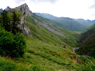 Mountain peak siding a green valley