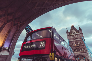 London iconic Tower Bridge and double decker red bus
