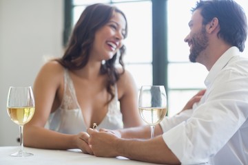 Man proposing a woman with a ring