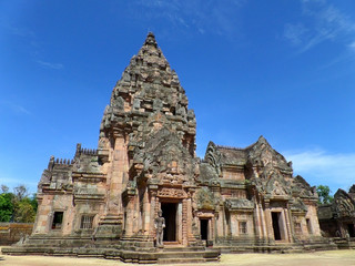 Fototapeta na wymiar Prasat Hin Phanom Rung against vibrant blue sky, well preserved ancient Khmer Temple in Buriram Province of Thailand