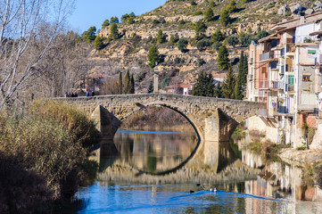 Fototapeta premium Bridge reflection in Valderrobres, Spain