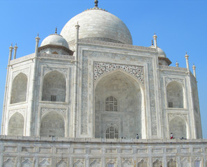 Fototapeta na wymiar Close perspective angle of the Taj Mahal mausoleum in Agra, India, with the main building dome and the entry portal