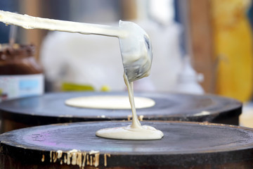 making pancakes on the stove